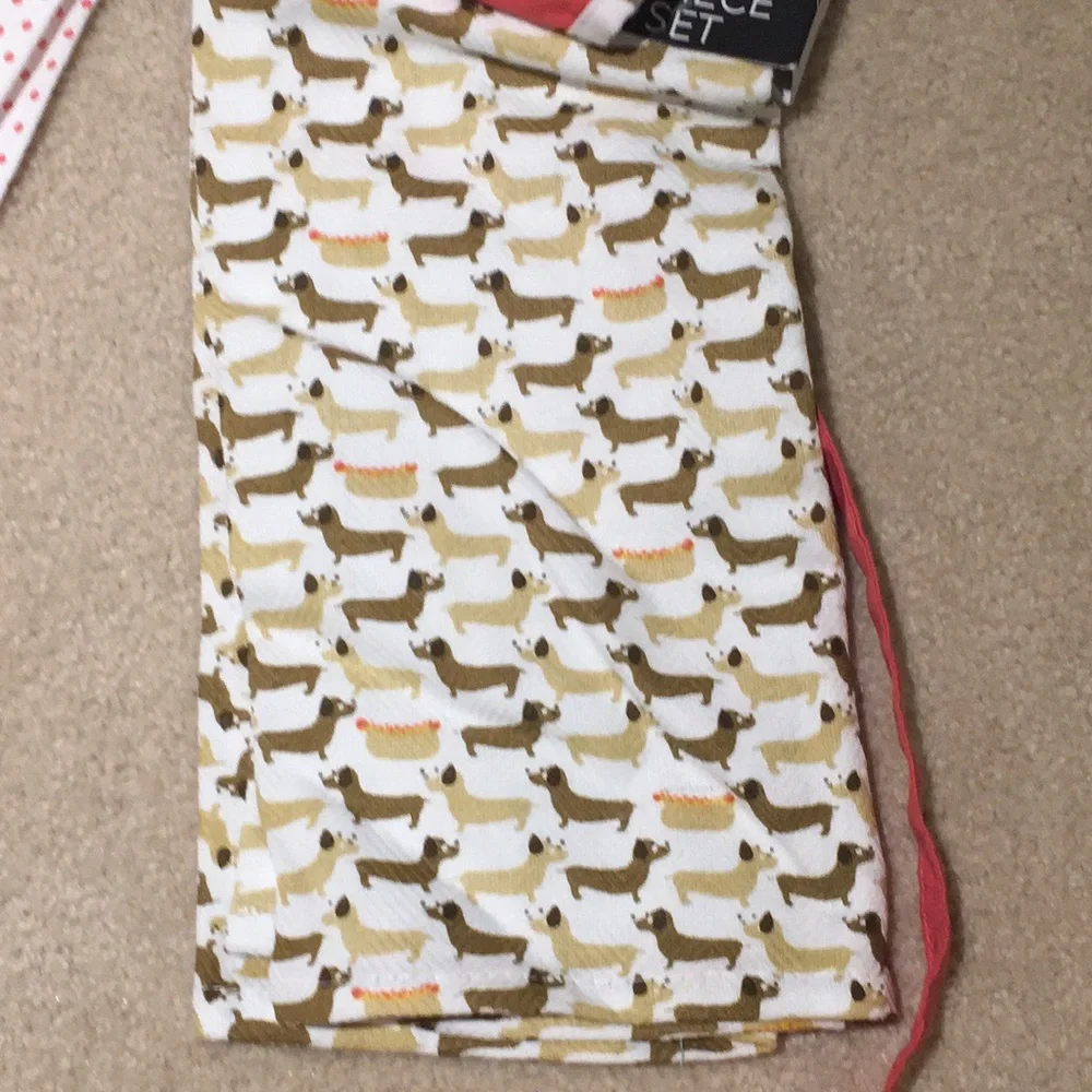Dachshund themed apron and dish towel set .